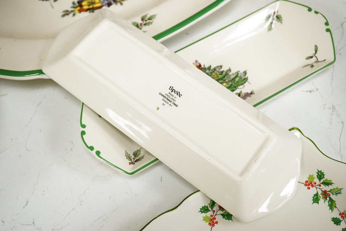 A Spode table service, Christmas Tree pattern. S 3324 to include a set of four bowls, platter and dishes, with some boxes, largest 36cm wide